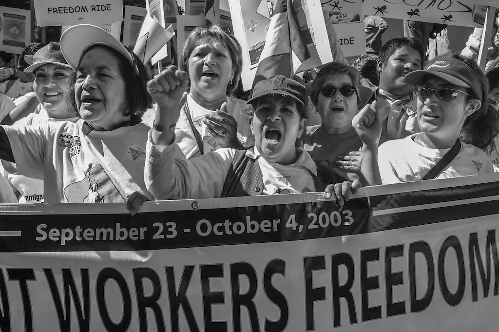Dolores Huerta, among others, demonstrating for immigration reform.