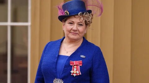 Labour Politician Emily Thornberry poses with their medal and insignia after being appointed a Dame Commander of the Order of the British Empire, Buckingham Palace, London on 10 June 2025 (AFP)