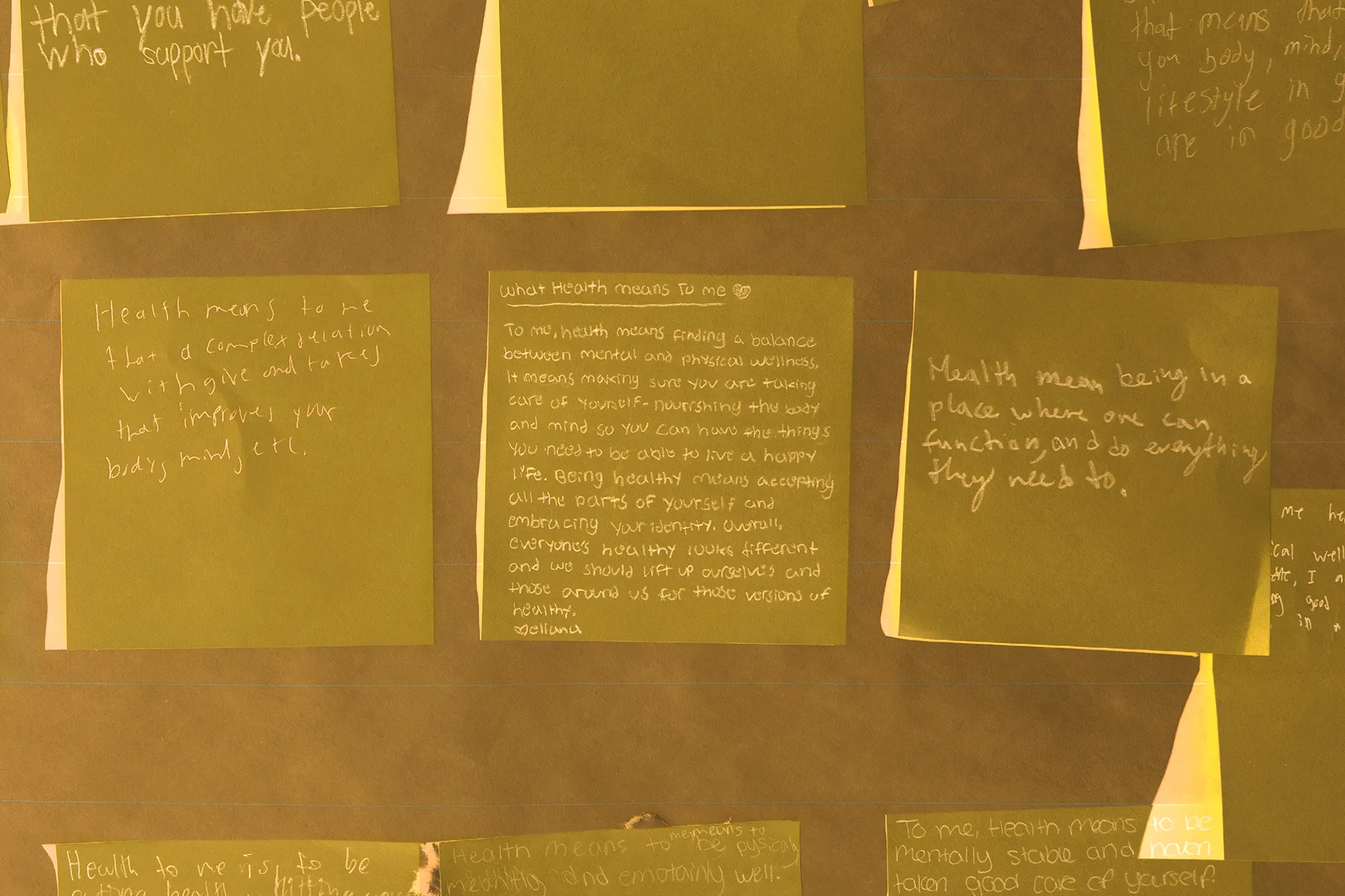 Post-Its answering the question, “What does health mean to you?”