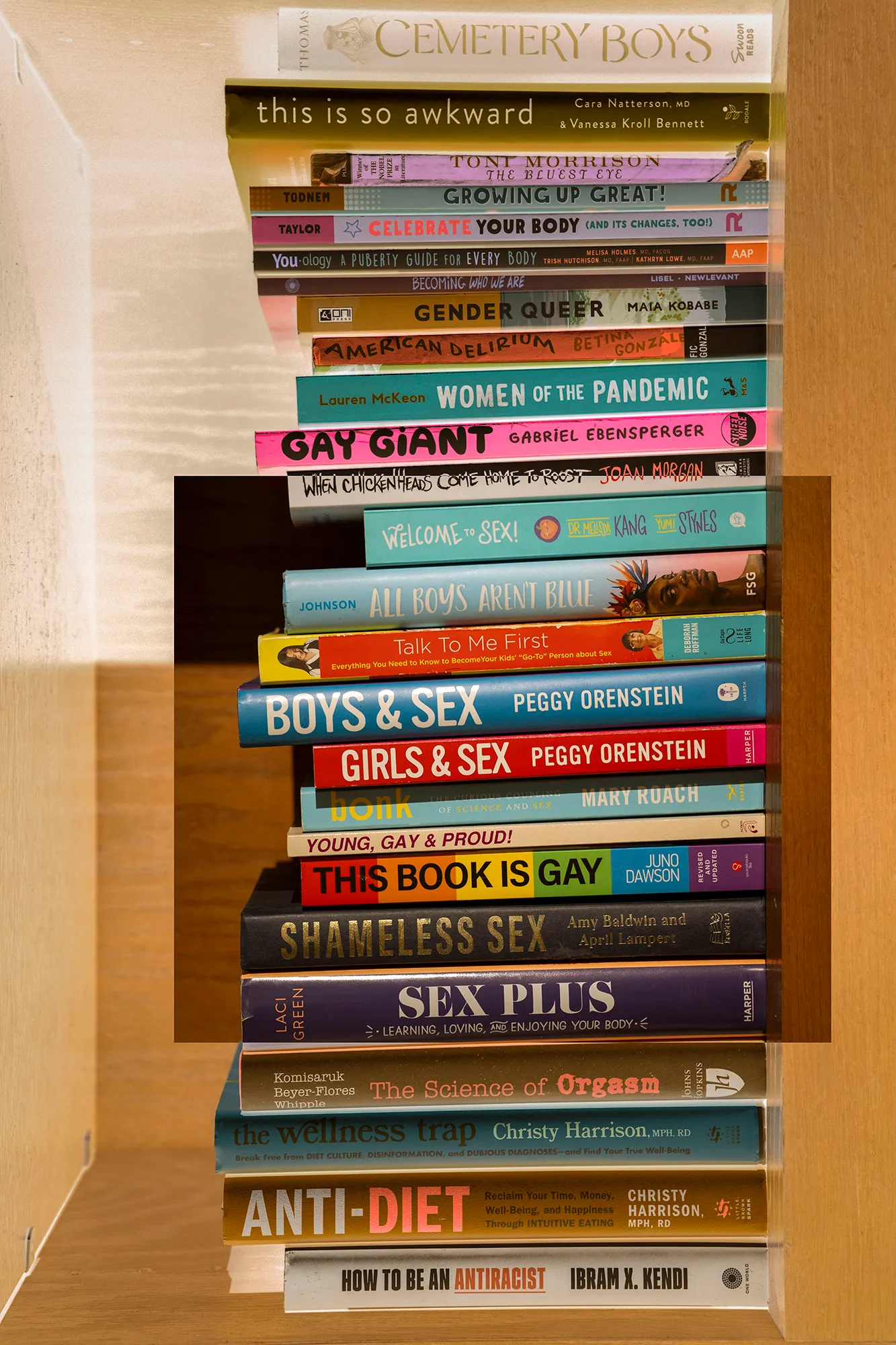 Large stake of books on their side.
